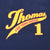 Close-up of yellow and red Thomas the Tank Engine 1 front print on navy fabric