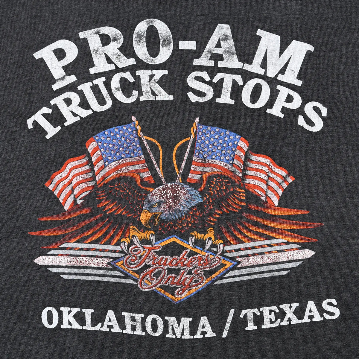 Close-up of Pro-Am Truck Stops eagle, American flags, and Truckers Only back graphic
