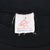 Neck tag on black T-shirt showing Canadiana, Made in Canada, and adult XL markings