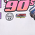Close-up of back print with pink 90s text, Knoxville Raceway seal, and Action Sports Apparel logo