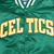 Close-up of white and gold Celtics lettering on green satin jacket front