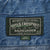 Close-up of Polo Country Ralph Lauren neck label with Made in U.S.A. and 100% cotton tags