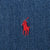 Close-up of red Ralph Lauren polo player embroidery on blue denim fabric