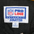Close-up of NFL Pro Line by Starter neck label with small size tag