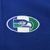 Close-up of embroidered Seattle Seahawks oval logo on blue fleece