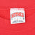 Close-up of Nutmeg Mills XL Made in USA neck label inside red sweatshirt