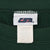 Close-up of USA brand neck tag and X-Large care label inside dark green sweatshirt