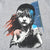 Close-up of multicolor Cosette character graphic on gray sweatshirt