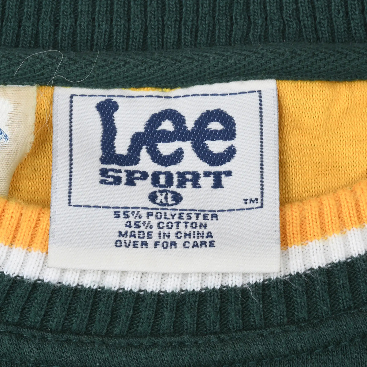 Close-up of Lee Sport XL neck label and green, yellow, and white ribbed collar