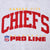 Close-up of red and gold Kansas City Chiefs NFL Pro Line embroidered chest graphic