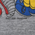Close-up of Walt Disney Productions copyright text beneath the character print