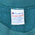 Champion Reverse Weave XXL label inside the teal sweatshirt collar