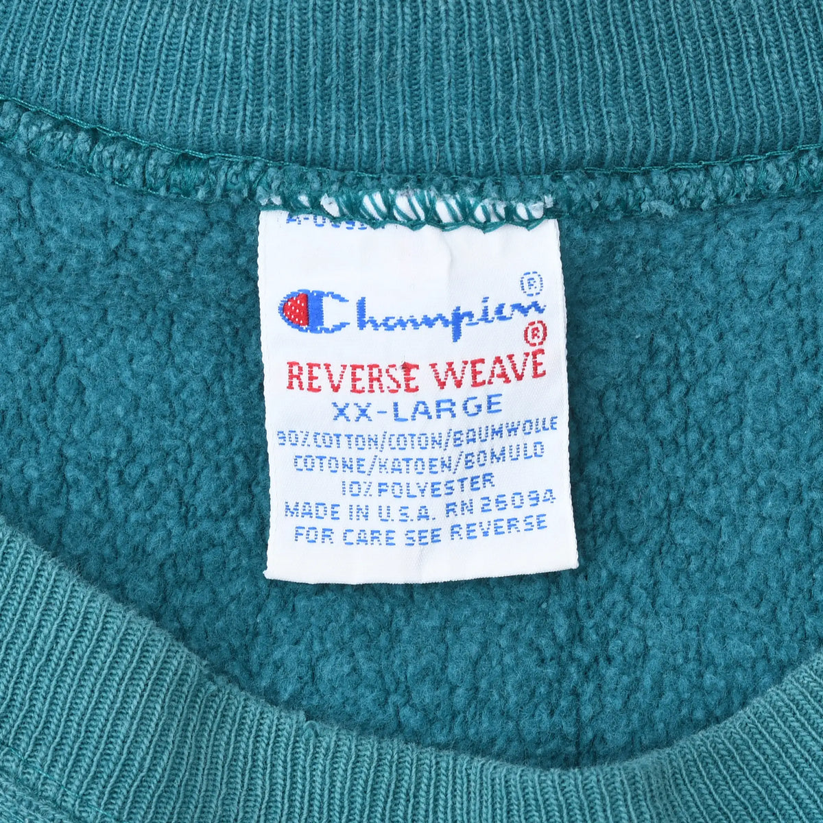 Champion Reverse Weave XXL label inside the teal sweatshirt collar