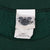 Close-up of The Disney Catalog neck tag marked small and Made in U.S.A.