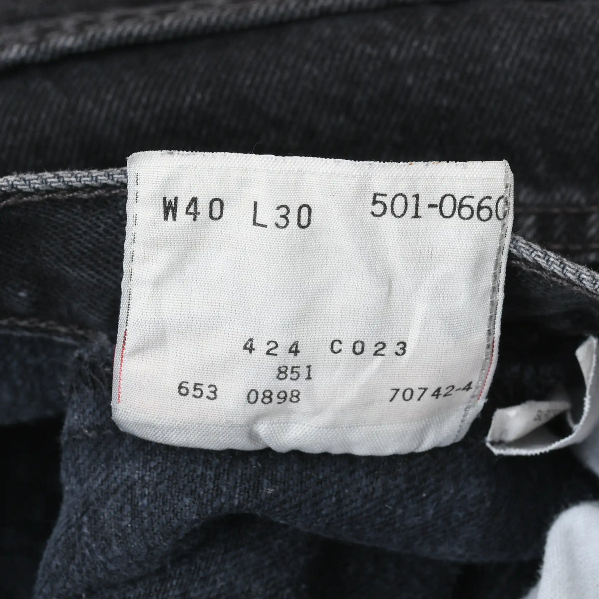Inside Levi's label marked W40 L30, 501-0660, and factory code 653