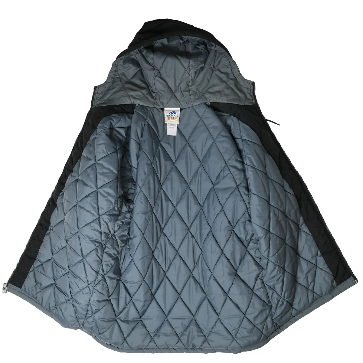 Open Adidas windbreaker showing gray diamond-quilted lining and interior neck label