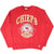 Full front view of red Kansas City Chiefs crewneck sweatshirt with crest graphic