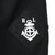 Close-up of white Polo Ralph Lauren crest embroidery on black sleeve patch