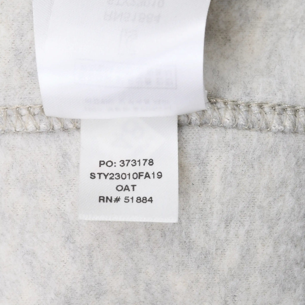Close-up of interior label showing Patagonia style STY23010FA19 and color OAT