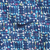 Close-up of navy Nike Swoosh embroidery on multicolor blue patterned fabric