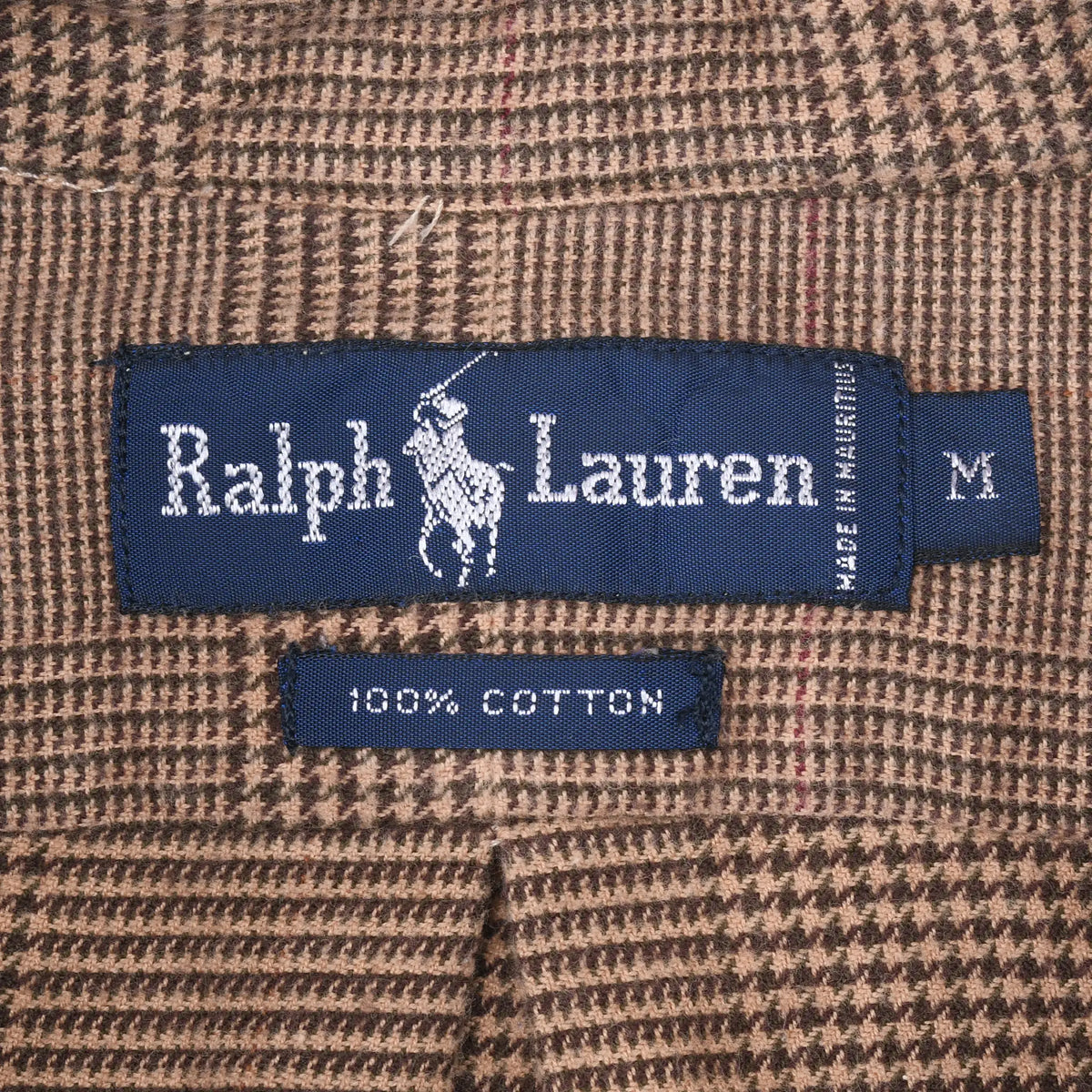 Ralph Lauren neck label showing pony logo, size M, Made in Malaysia, and 100% cotton tag