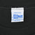 Salem Sportswear neck label on black T-shirt showing Made in USA and 100% cotton