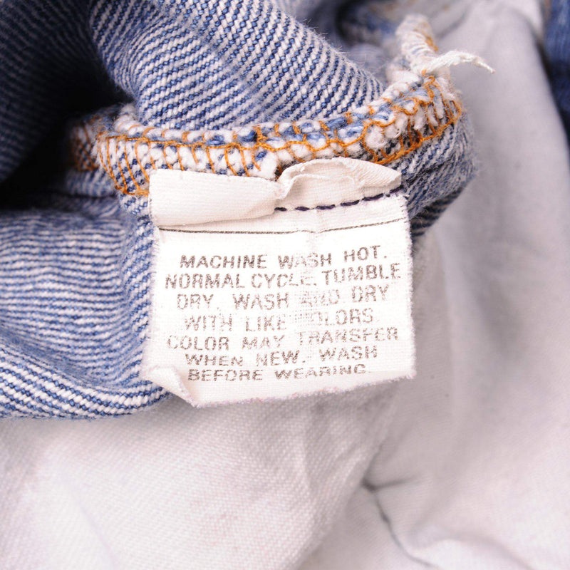 Beautiful Indigo Levis 501 Jeans 1985-1988 Made in USA with a medium blue wash and a nice contrast between light and medium blue.  Size on Tag 29X30  ACTUAL SIZE 29X29  Back Button #653