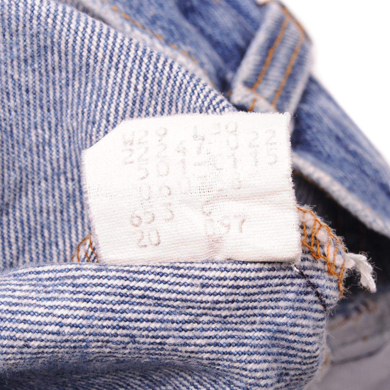 Beautiful Indigo Levis 501 Jeans 1985-1988 Made in USA with a medium blue wash and a nice contrast between light and medium blue.  Size on Tag 29X30  ACTUAL SIZE 29X29  Back Button #653