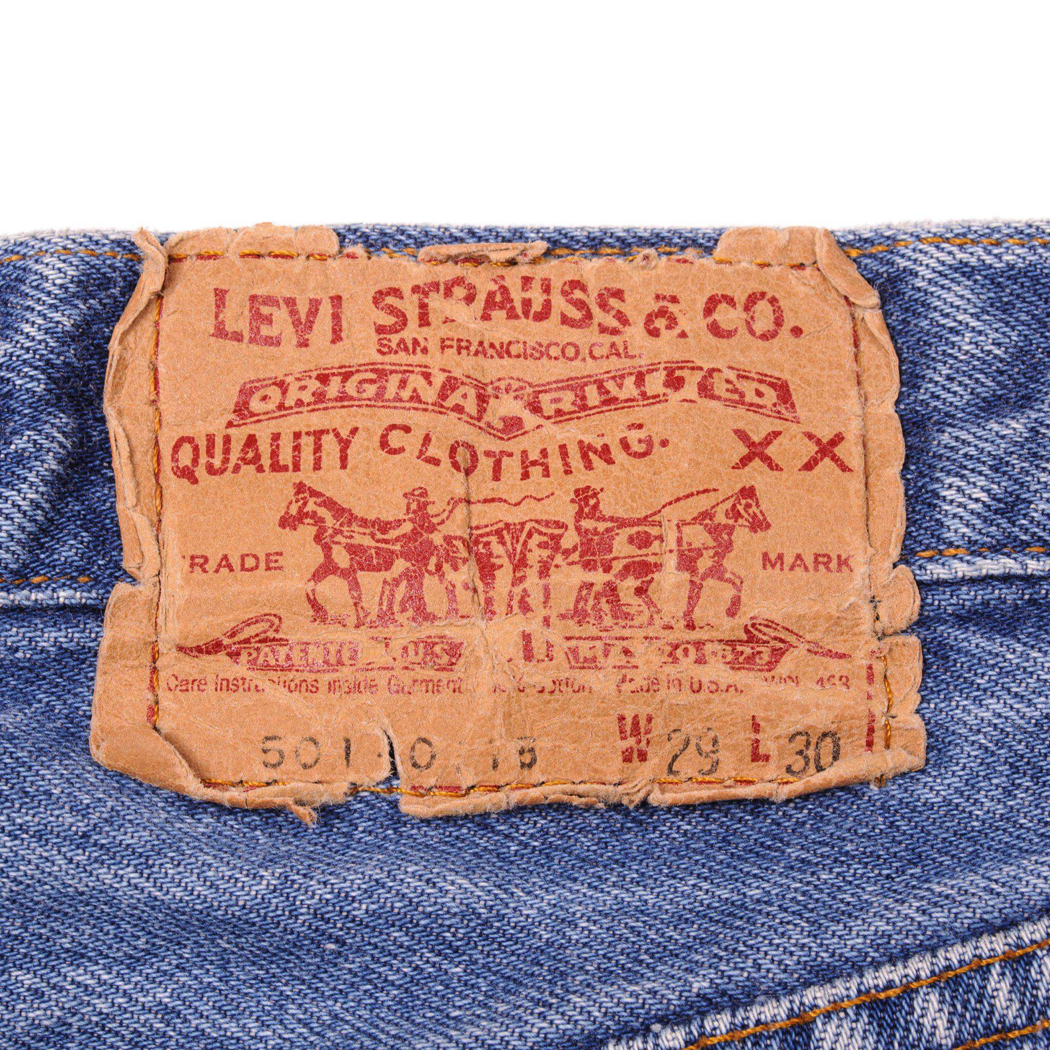 Beautiful Indigo Levis 501 Jeans 1985-1988 Made in USA with a medium blue wash and a nice contrast between light and medium blue.  Size on Tag 29X30  ACTUAL SIZE 29X29  Back Button #653