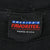 America's Favorites neck label on black Chicago Bulls T-shirt