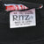 Ritz size M care label stating 100% cotton, pre-shrunk and made in China
