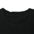 Close-up of the black ribbed crew neck and tagless inner collar