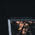 Close-up of 1992 R.K. Stratman copyright text above the front graphic