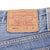 Beautiful Indigo Levis 501 Jeans 1990s Made in USA with Medium Light Wash With Light Whiskers Size on tag 36X36 Actual Size 34X33 Back Button #552