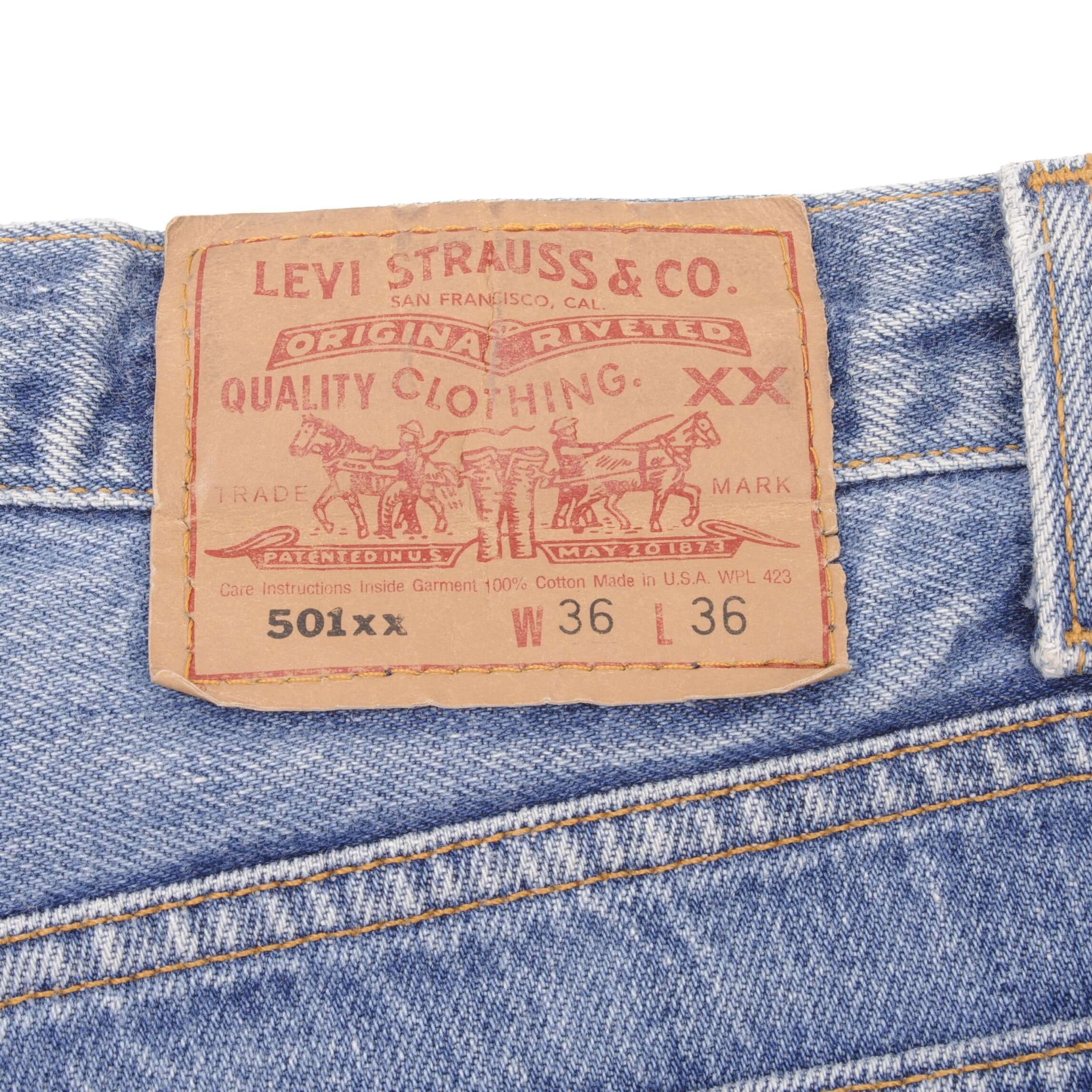 Beautiful Indigo Levis 501 Jeans 1990s Made in USA with Medium Light Wash With Light Whiskers Size on tag 36X36 Actual Size 34X33 Back Button #552