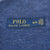 Polo Ralph Lauren neck label and M size tag on blue sweater