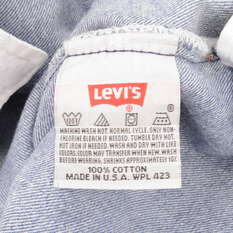 Beautiful Indigo Levis 501 Jeans 1990s Made in USA with Medium Light Wash With Light Whiskers Size on tag 36X36 Actual Size 34X33 Back Button #552