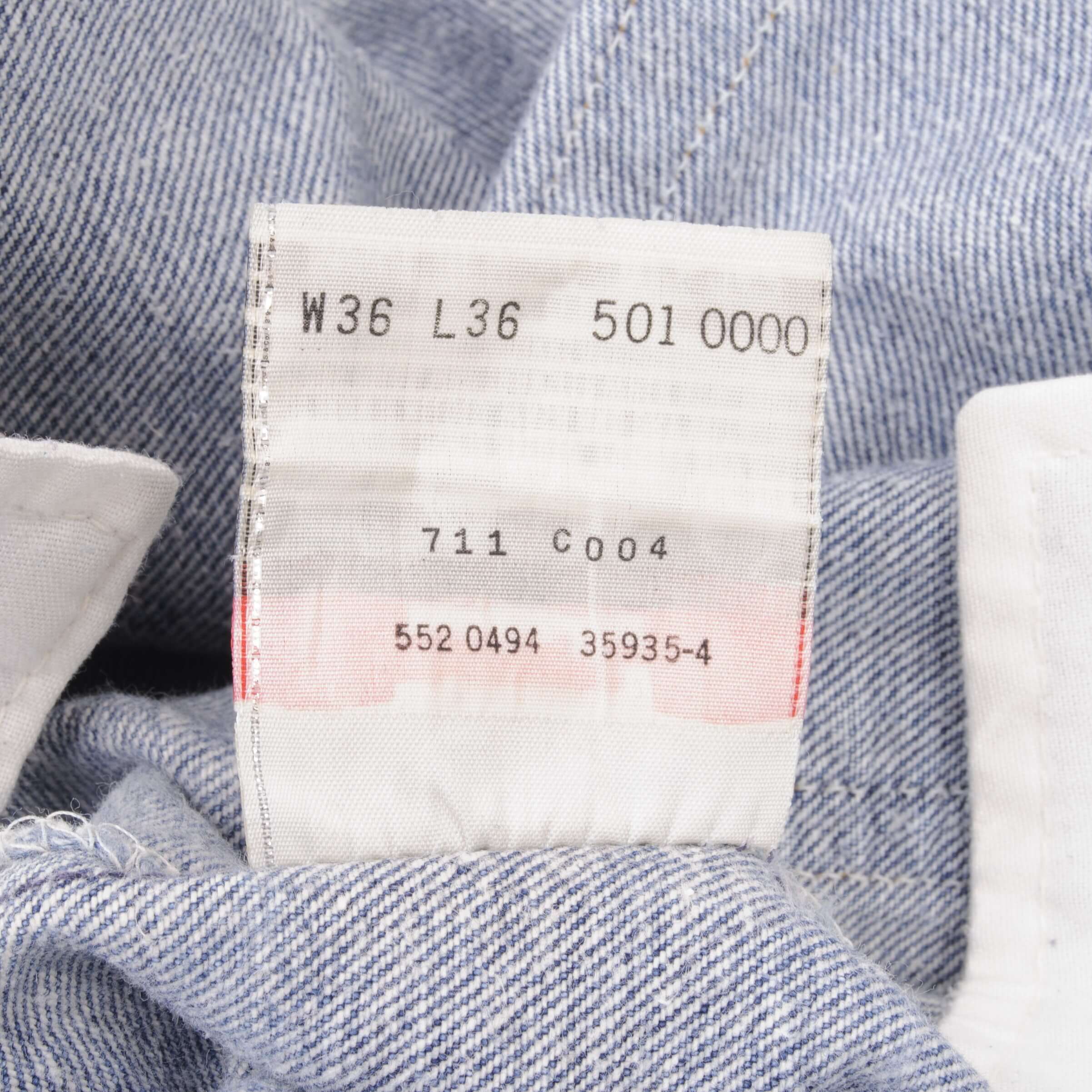 Beautiful Indigo Levis 501 Jeans 1990s Made in USA with Medium Light Wash With Light Whiskers Size on tag 36X36 Actual Size 34X33 Back Button #552