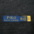 Polo Ralph Lauren neck label and XXL size tag on dark grey sweater fabric
