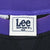 Lee Sport medium neck label beneath the purple sweatshirt collar