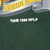 Close-up of TM and 1996 NFLP licensing print beneath the New Orleans, Louisiana banner