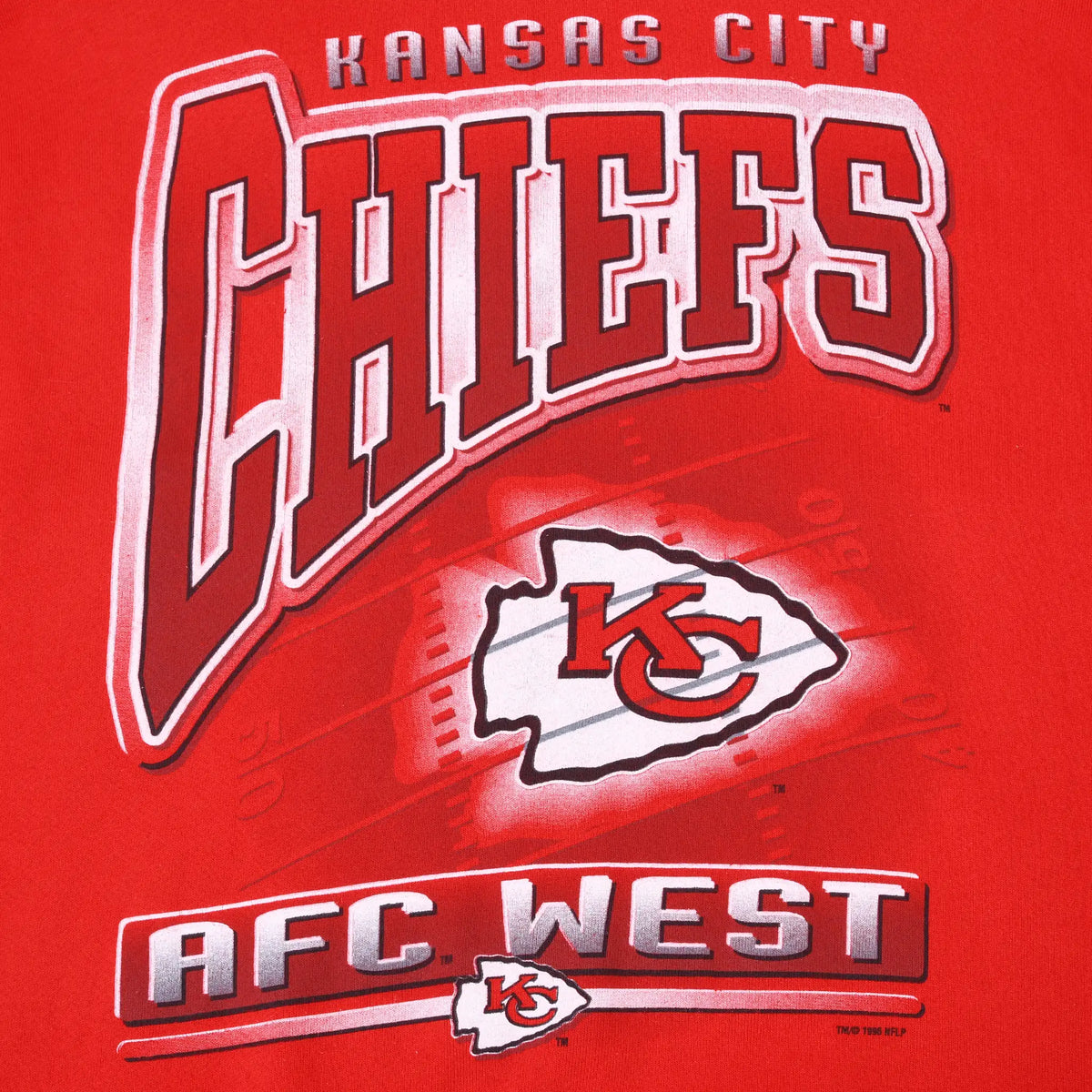 Close-up of Kansas City Chiefs arrowhead logo and AFC West front graphic