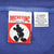 Mickey Inc neck label and X-Large care tag inside purple Disney sweatshirt