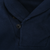 Close-up of navy shawl collar and two-button neckline