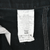 Interior Carhartt care label showing B01-BLK style and Made in USA text