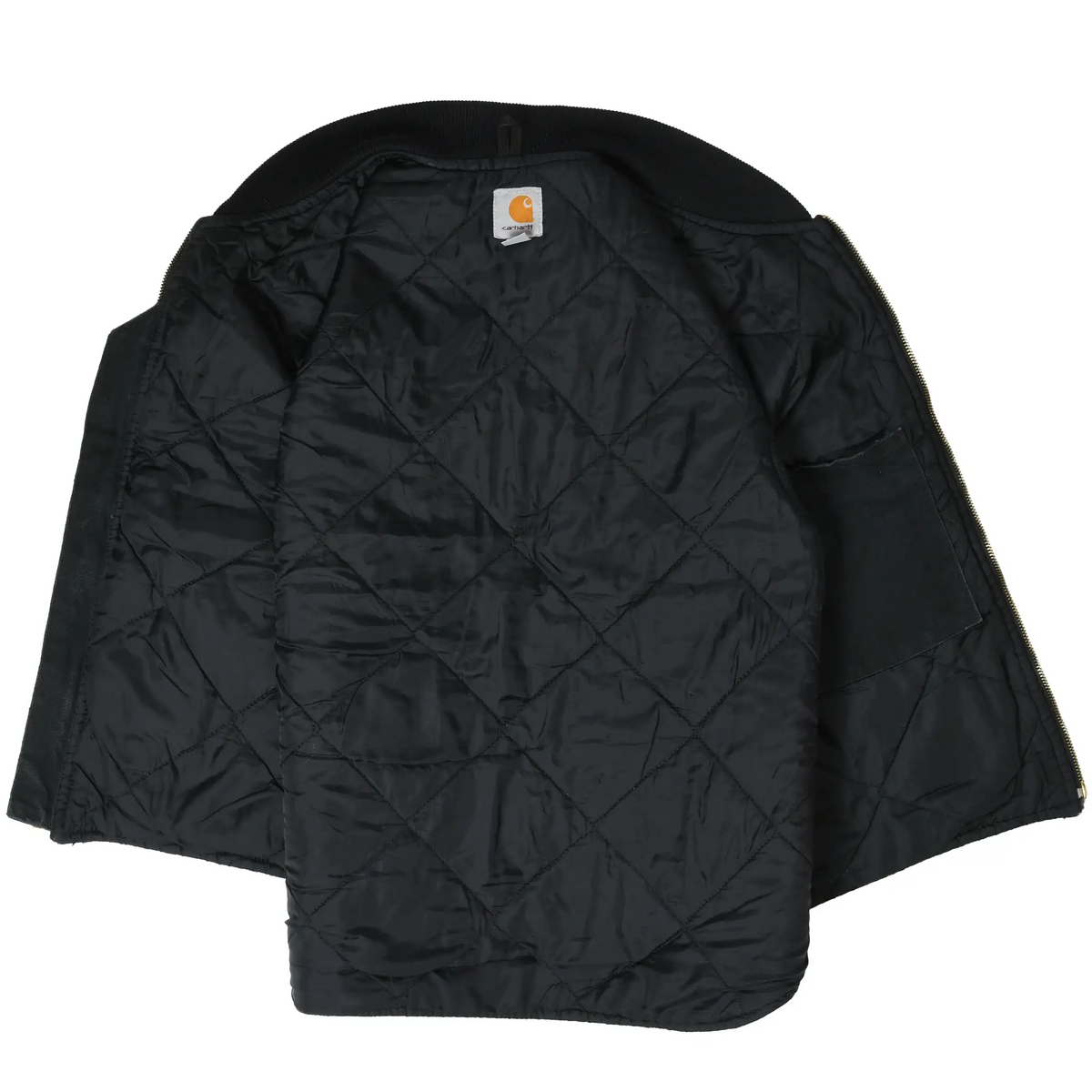 Open black Carhartt vest showing diamond-quilted interior lining and inside pocket