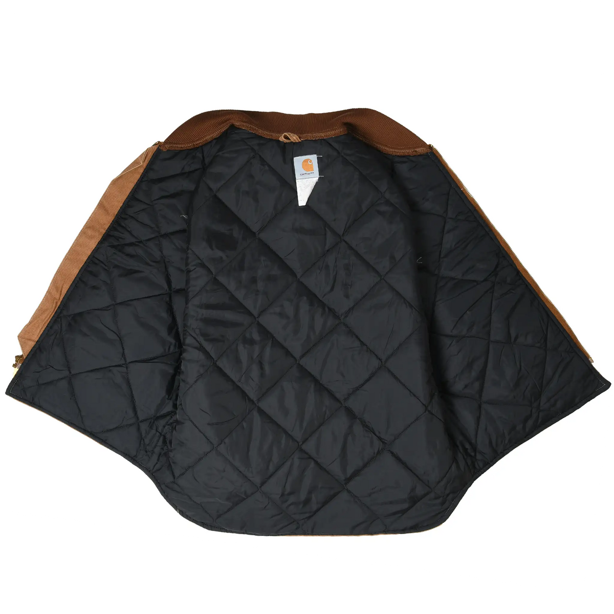Open Carhartt V01 vest showing black diamond-quilted interior lining and brown rib-knit collar
