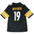 Back of black Steelers jersey with Smith-Schuster name, white 19, and yellow striped sleeves