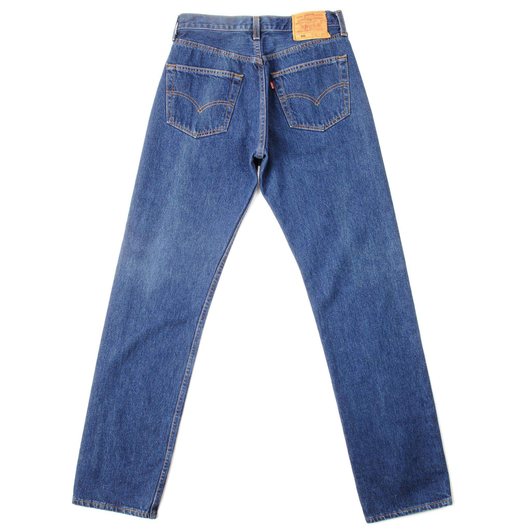 Beautiful Indigo Levis 501 Jeans from the 90's Made in USA with a medium blue wash.  Size 30x33  Back Button #544