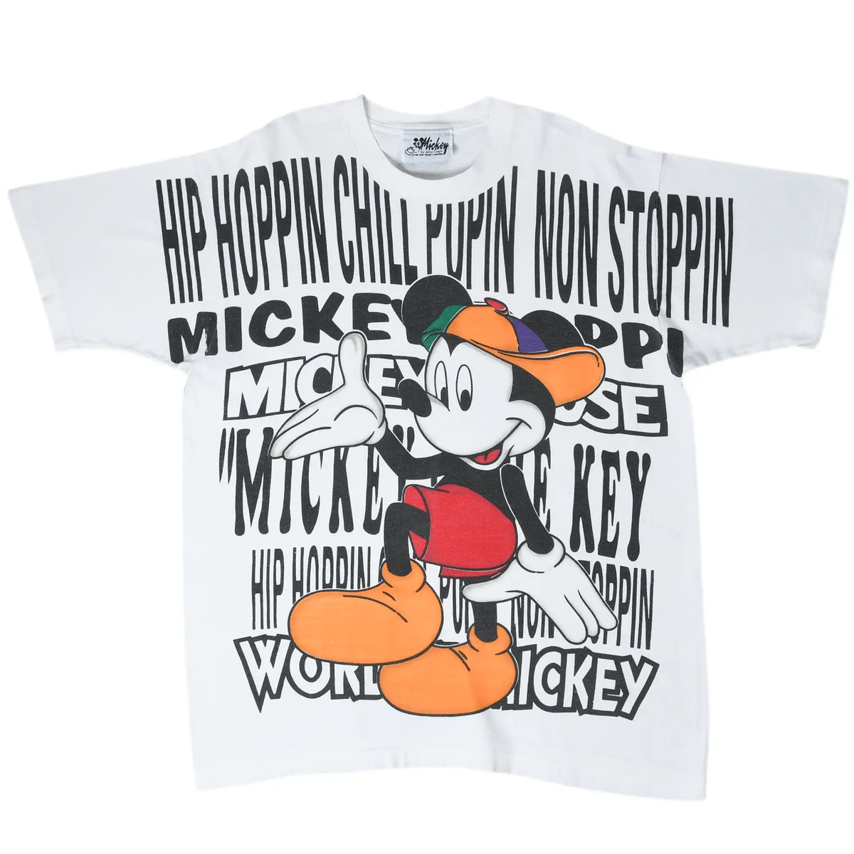 Full front view of white Disney Mickey Mouse tee with colorful character and black hip-hop text print
